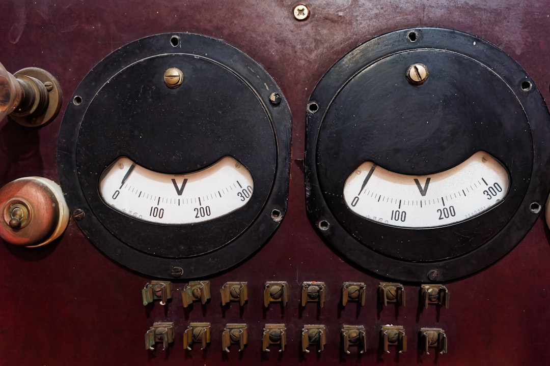 A close up of a clock on a wall